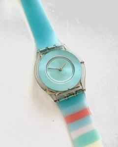 Swatch SKIN Pasteloop Clear Case, Turquoise Dial, Multicolour Strap. Not Working - Picture 1 of 4