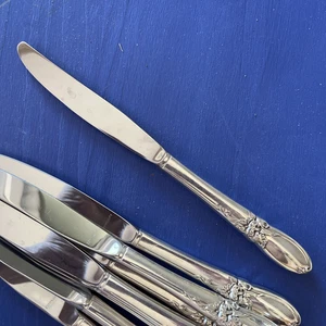 WHITE ORCHID 9.1" dinner knife, Community silverplate, unused - Picture 1 of 3