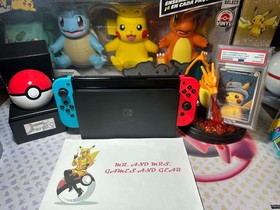 Nintendo Switch OLED Model HEG-001 Handheld Console - 64GB - Blue/Red Tested