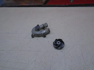 1999 KAWASAKI KLX 300R WATER PUMP IMPELLER + COVER 99 KLX 300 - Image 1 of 4