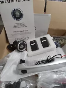 easy go smart key system 2012 toyota camry silver button start, alarm, remote - Picture 1 of 4
