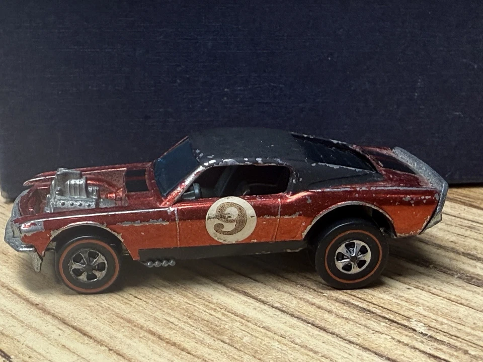 Mustang BOSS HOSS Redline 1969 - tapa negra original Mattel Hot Wheels vintage. Foto 1 de 4