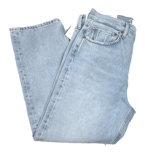 Pantalones de mezclilla Agolde años 90 recortados tiro medio sueltos rectos azules talla 29 en segmento rasgado rodilla - Imagen 1 de 10