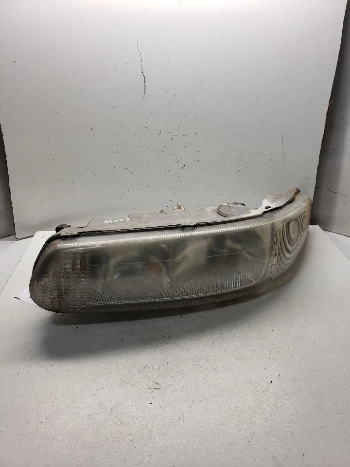 Faro izquierdo conductor compatible con 97-04 REGAL 1444289 Foto 1 de 4