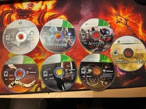 XBOX 360 Assassins Creed Revelations, Brotherhood, RAGE und COD MW2 nur Discs - Bild 1 von 5