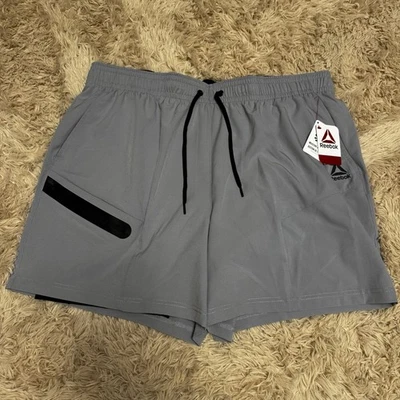 Shorts Reebok Masculino Tecido Texturizado 2 em 1 - Cinza - Tamanho 2XL - Novo em folha com etiquetas - Imagem 1 de 4