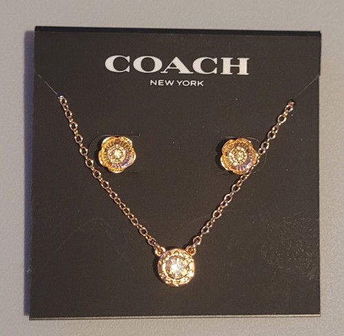 Set orecchini Coach cerchio aperto collana e borchie rosa tè oro rosa nuovi
