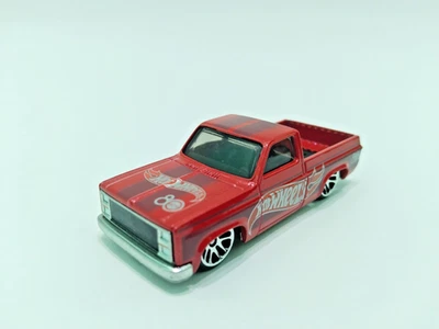 Hot Wheels 2025 '83 Chevy Silverado 80th Anniversary LOOSE form Pack - Immagine 1 di 4