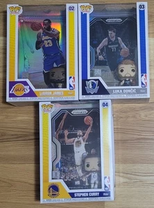 Funko Pop! NBA - Prizm - Stephen Curry 04, Luca Doncic 03 y Lebron James 02 - Imagen 1 de 6