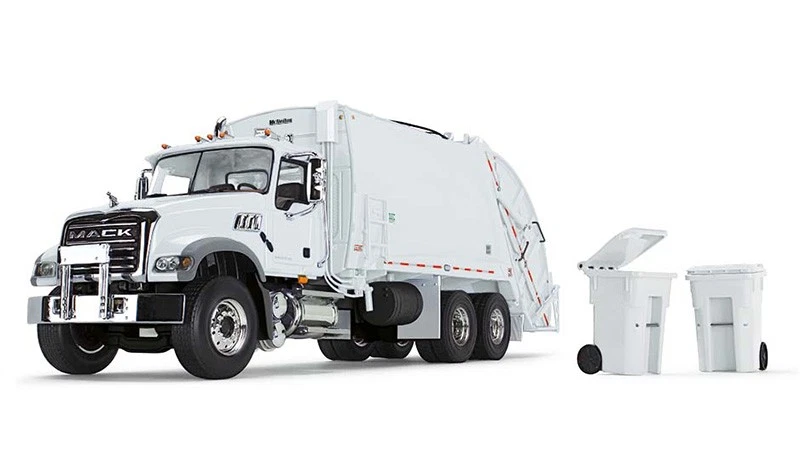 First Gear 10-4213 1:34 Mack Granite MP with McNeilus Rear Loader & Trash Carts - Image 1 of 1