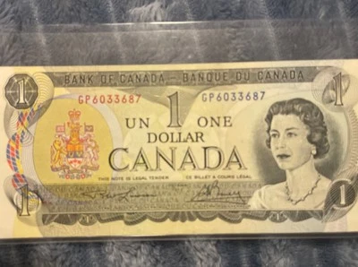 1973 Canadian $1 bill: Lawson-Bouey signature  (Circulated, pristine condition) - Image 1 of 4