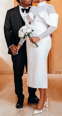 Elegantes vestidos de novia de satén con funda de encaje hasta el té cuello alto nuevos Foto 1 de 4