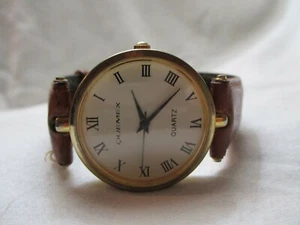 Quemex Analog Wristwatch with a Buckle Band and Quartz Movement - Picture 1 of 12