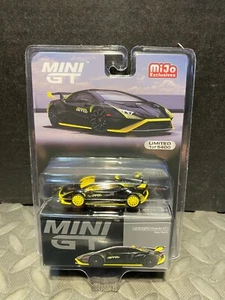 1/64 MINI GT LAMBORGHINI HURACAN STO NERO NOCTIS BLACK CHASE CAR MIJO EXCLUSIVES - Picture 1 of 2