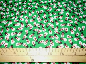 32" Tossed Snowmen on Green Christmas Fabric - Picture 1 of 1