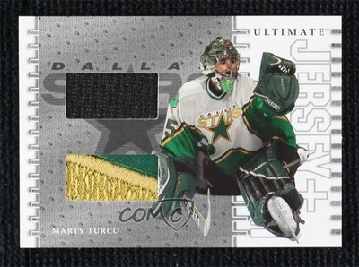 2003-04 ITG Ultimate Memorabilia 4th Edition Jersey + Emblem /10 Marty Turco - Image 1 of 3