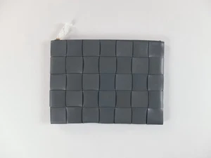 (SIN IMPUESTO ADUANERO) BOTTEGA VENETA Cassette gris intrecciato bolso clutch cuero - Imagen 1 de 10