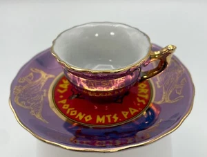 Mini taza y platillo dorado iridiscente púrpura y dorado recuerdo Césares Pocono Resorts - Imagen 1 de 11