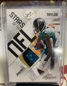 Parche de 4 colores Playoff Prestige Stars of the NFL 2009 Fred Taylor/50 Jaguars - Imagen 1 de 2