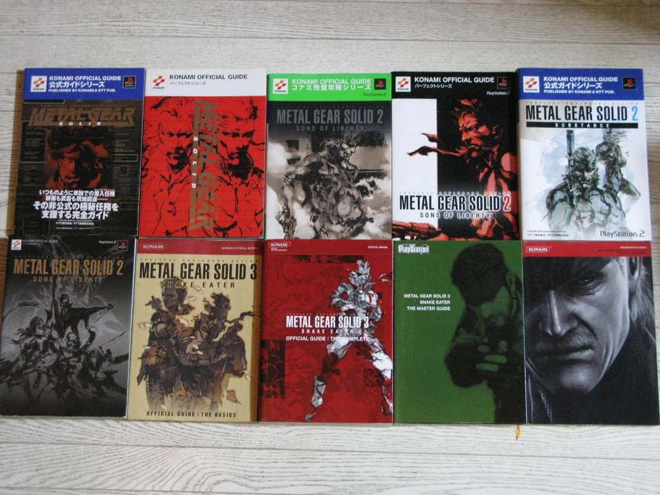 Metal Gear Solid 1 2 3 4 SET X10 KONAMI OFFICIAL GUIDE BOOK SNAKE JAPAN PS1 PS2  - Image 1 of 1