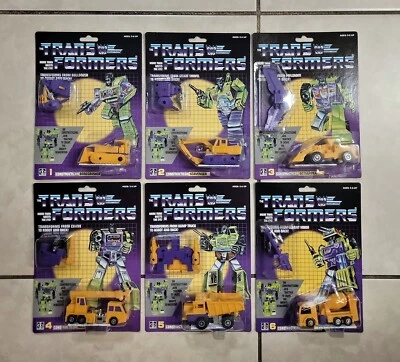 TRANSFORMERS G1 G2 CARDED YELLOWCONSTRUCTICONS IN US MOSC! DECEPTICON DEVASTATOR - Image 1 of 3