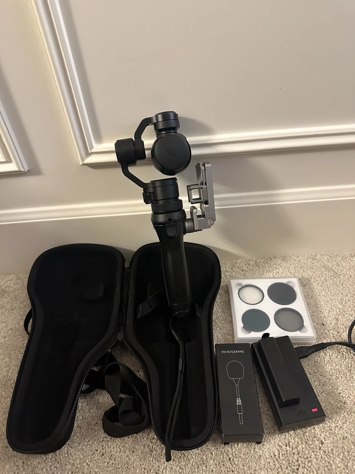 DJI Osmo + Accessories - Image 1 of 1