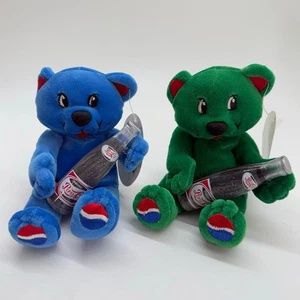 Promozioni Vintage Cielo Blu e Verde Promo Orso PEPSI anno 2000 con etichette - Foto 1 di 11