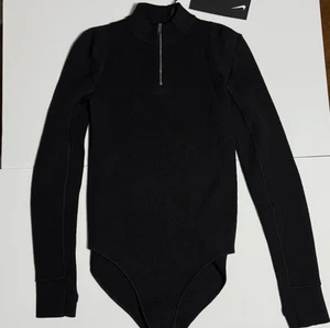 Body Nike donna grande nero a costine maglia manica lunga 1/2 zip FD8149-010 nuovo - Foto 1 di 5