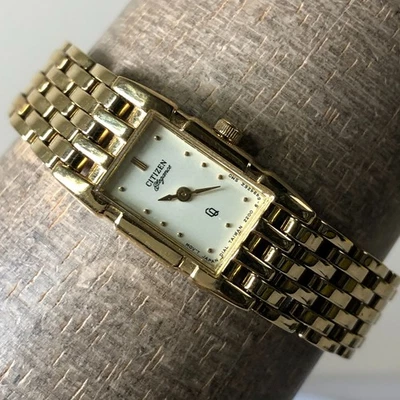 Reloj Citizen Elegance Mujer Moda Tono Dorado Rectangular Cuarzo 13mm 5 1/4" Foto 1 de 4