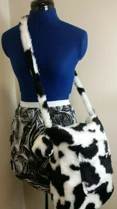 TST Black and white cow print fur crossbody bag with two pockets, zip fastening. - Picture 1 of 6