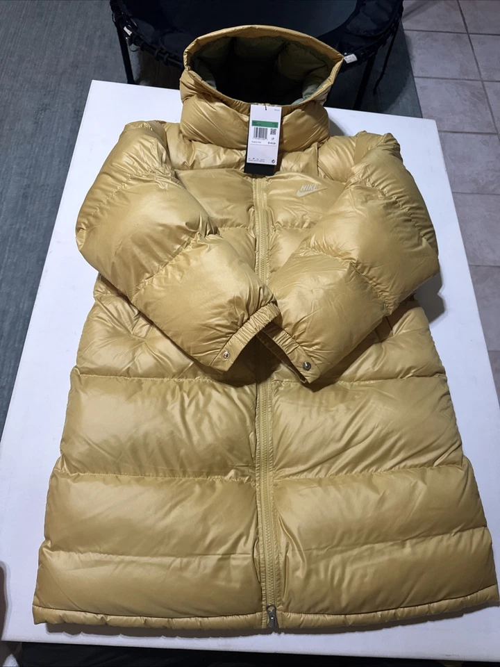 Jaqueta Parka de Inverno Infantil XL Nike Therma-FIT Repel Puffer com Capuz Dourada FD2842-723 - Imagem 1 de 4