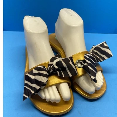  Женские сандалии-шлепанцы Okabashi без застежек на плоской подошве с логотипом бант золотисто-коричневые M/L  - Изображение 1 из 4