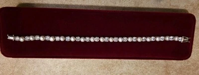 Women's Pearl and Rhinestone 9.25 silver bracelet total length 8 inch New W/box! - Image 1 of 4