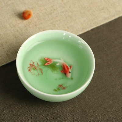 Promociones Taza de té china de kungfu porcelana relieve de pescado taza tallada 1,7 oz floral Foto 1 de 4