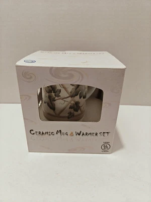 Juego de calentador y taza de cerámica Foto 1 de 4