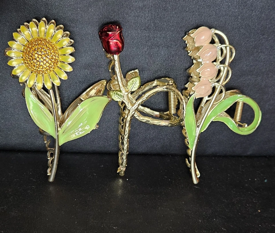 Juego de 3 pinzas para el cabello grandes con flores - rosa, girasol - tono dorado Foto 1 de 2