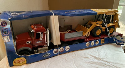 Bruder MACK Granite Low Loader and JCB 4CX 02813 - Image 1 of 4