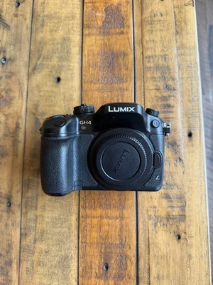 Cámara profesional sin espejo Panasonic Lumix GH4 4K + lente Foto 1 de 4