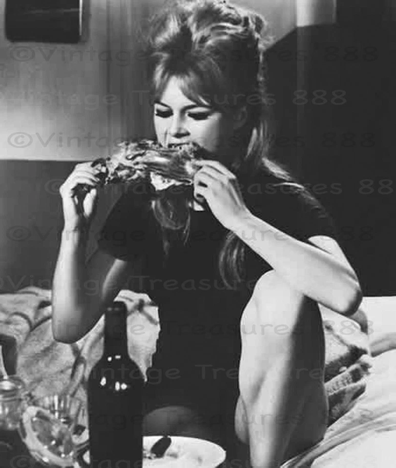 Brigitte Bardot Eating Chicken Photo Print Poster - Image 1 of 1
