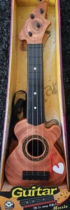 18" KIDS WOODEN EFFECT BEGINNERS GUITAR 4 STRING MUSIC ROCK STAR GIRLS BOYS TOY - Picture 1 of 2