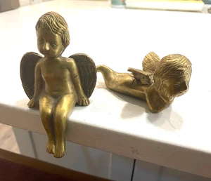 Par de querubines de latón para sentarse y acostarse 4-1/2" y 4" - Imagen 1 de 11