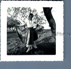 FOUND B&W PHOTO N_0651 PRETTY WOMAN IN DRESS POSED BY TREE