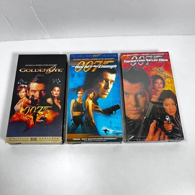 James Bond 007 Goldeneye, World is Not Enough, Tomorrow Never Dies VHS Lot Foto 1 de 4
