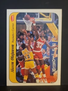 1986-87 Fleer Stickers #9 Akeem Olajuwon HOF ROCKETS - Picture 1 of 2