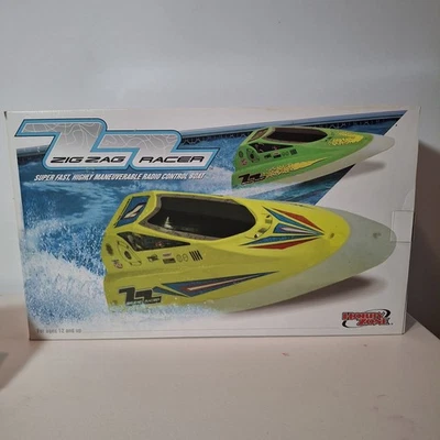 VINTAGE 2002 ZIG ZAG RC BOAT by Hobby Zone - Image 1 of 4
