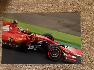 KIMI RAIKKONEN signed Car PHOTO FERRARI F1 12 X 7.75" 30 X 20cm original #1 - Picture 1 of 6