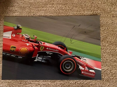 KIMI RAIKKONEN signed Car PHOTO FERRARI F1 12 X 7.75" 30 X 20cm original #1 - Image 1 of 4