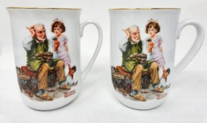 1982 Norman Rockwell Museum Kaffeebecher The Cobbler Girl Puppe Schuhe - 2er Set - Bild 1 von 4