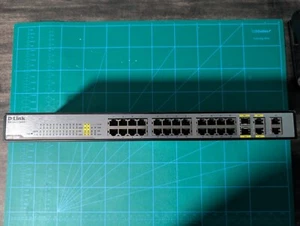 D-Link DES-1228 Web Smart 24-Port 10/100Mbps Switch with 4 Gigabit Ports & 2 Com - Picture 1 of 3