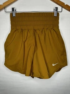 Nike Dri-Fit Bronzine pantaloncini foderati vita ultra alta 3" donna taglia XS NUOVI - Foto 1 di 11